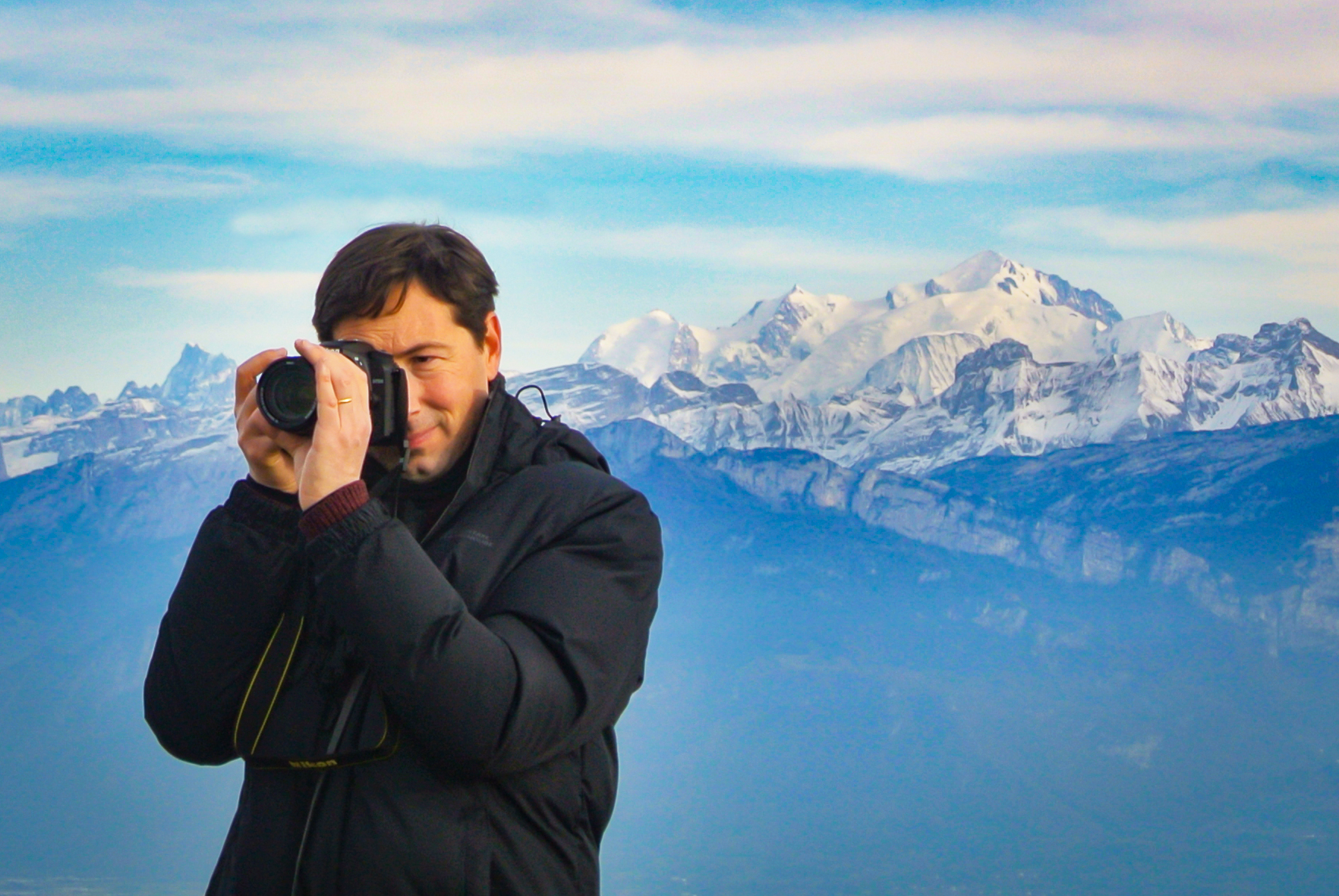 Pierre taking photos in Savoie Mont Blanc © French Moments